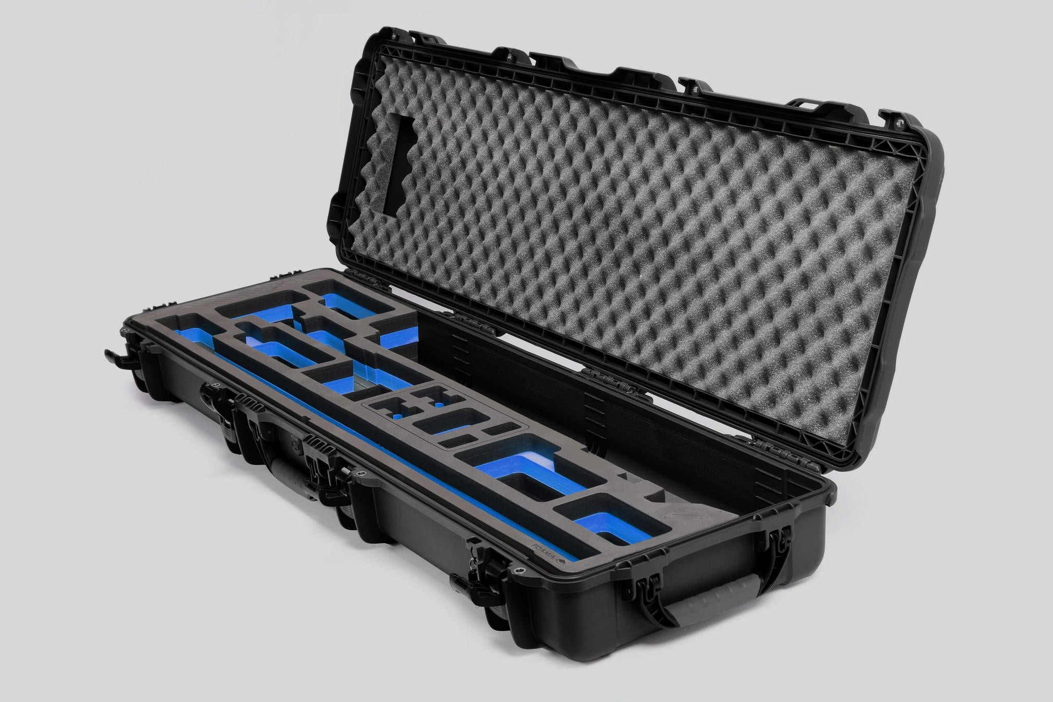 Angled view of Foama Fortified Black Color Hard Case and Custom Foam Insert with Blue Layer for DJI D-RTK 2 Mobile Station