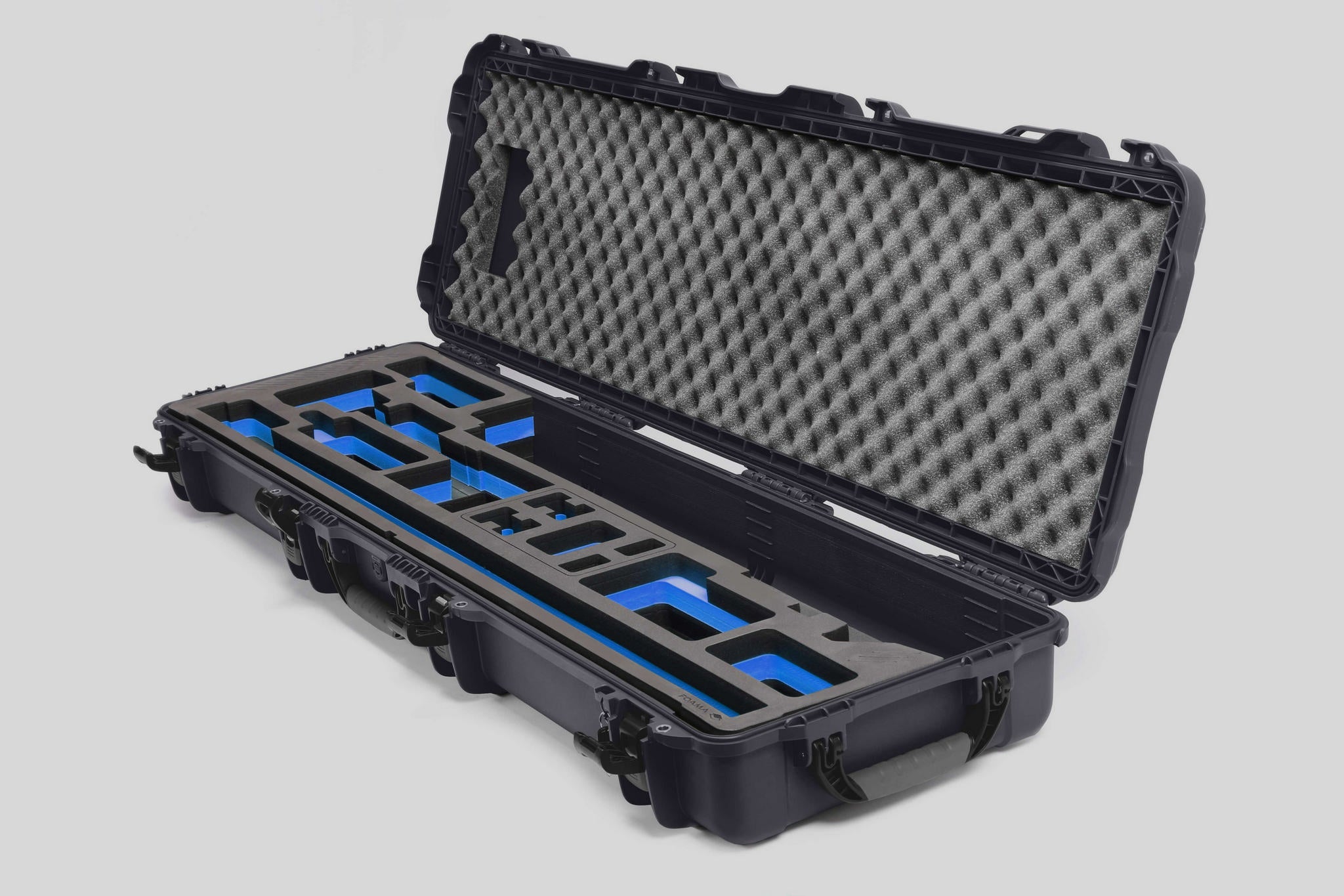 Angled view of Foama Fortified Graphite Color Hard Case and Custom Foam Insert with Blue Layer for DJI D-RTK 2 Mobile Station