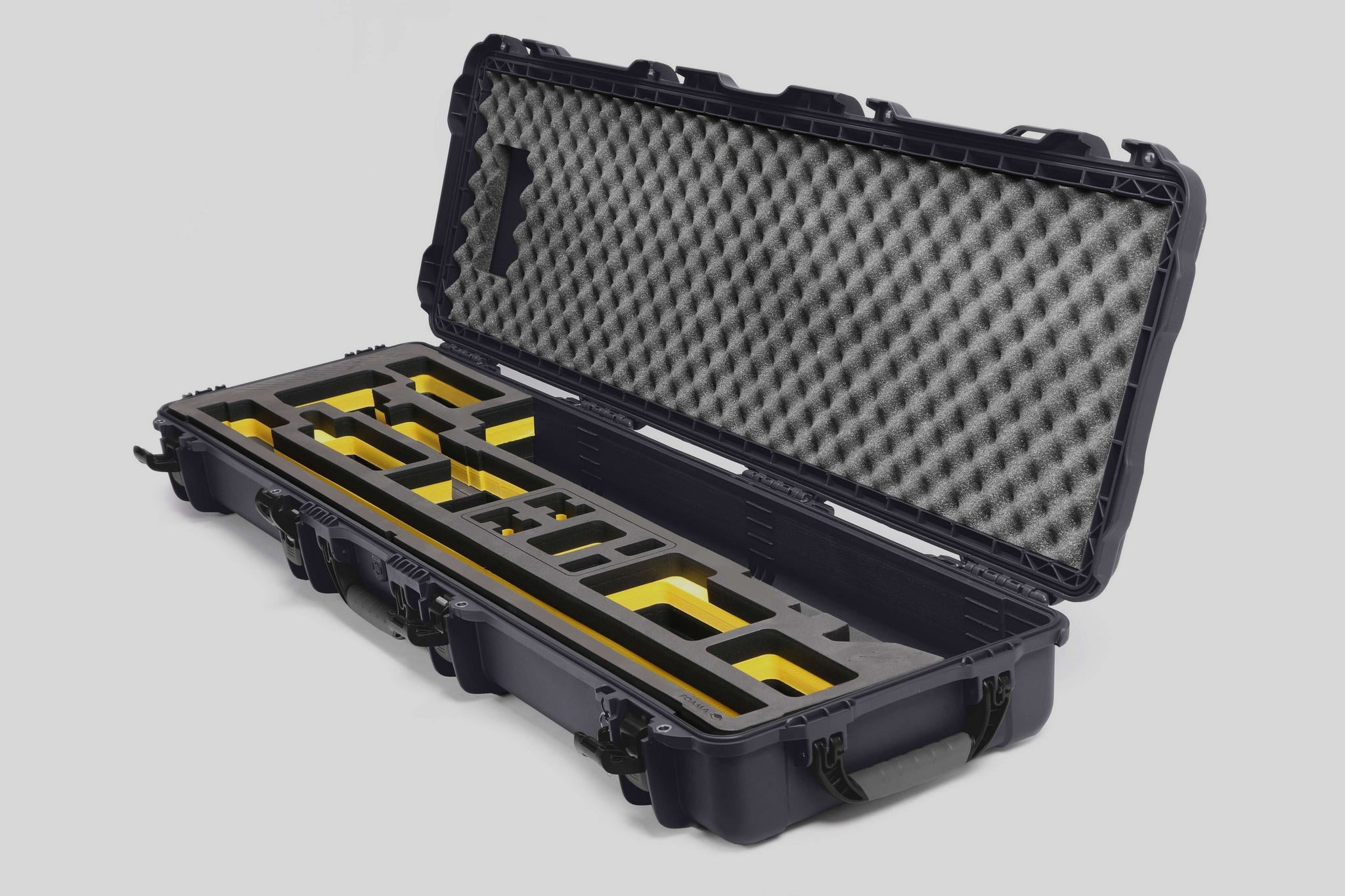 Angled view of Foama Fortified Graphite Color Hard Case and Custom Foam Insert with Yellow Layer for DJI D-RTK 2 Mobile Station