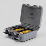 Angled view of Foama Silver Color Hard Case and Custom Foam Insert with a Stylish Yellow Layer for DJI Mini 3 & 4 Pro